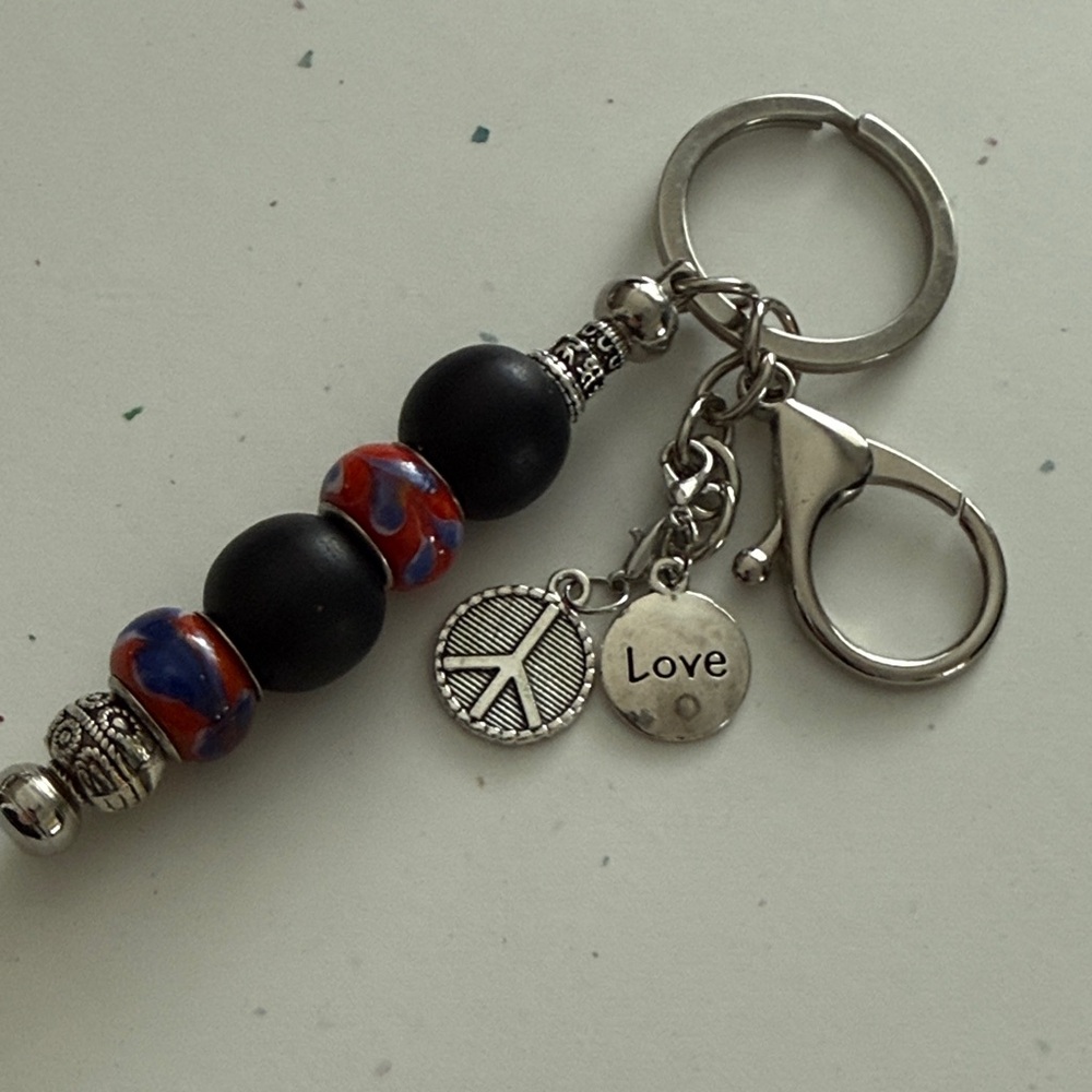 Beaded 'Love' Keychain with Peace Charm - Black & Red-Blue Accent